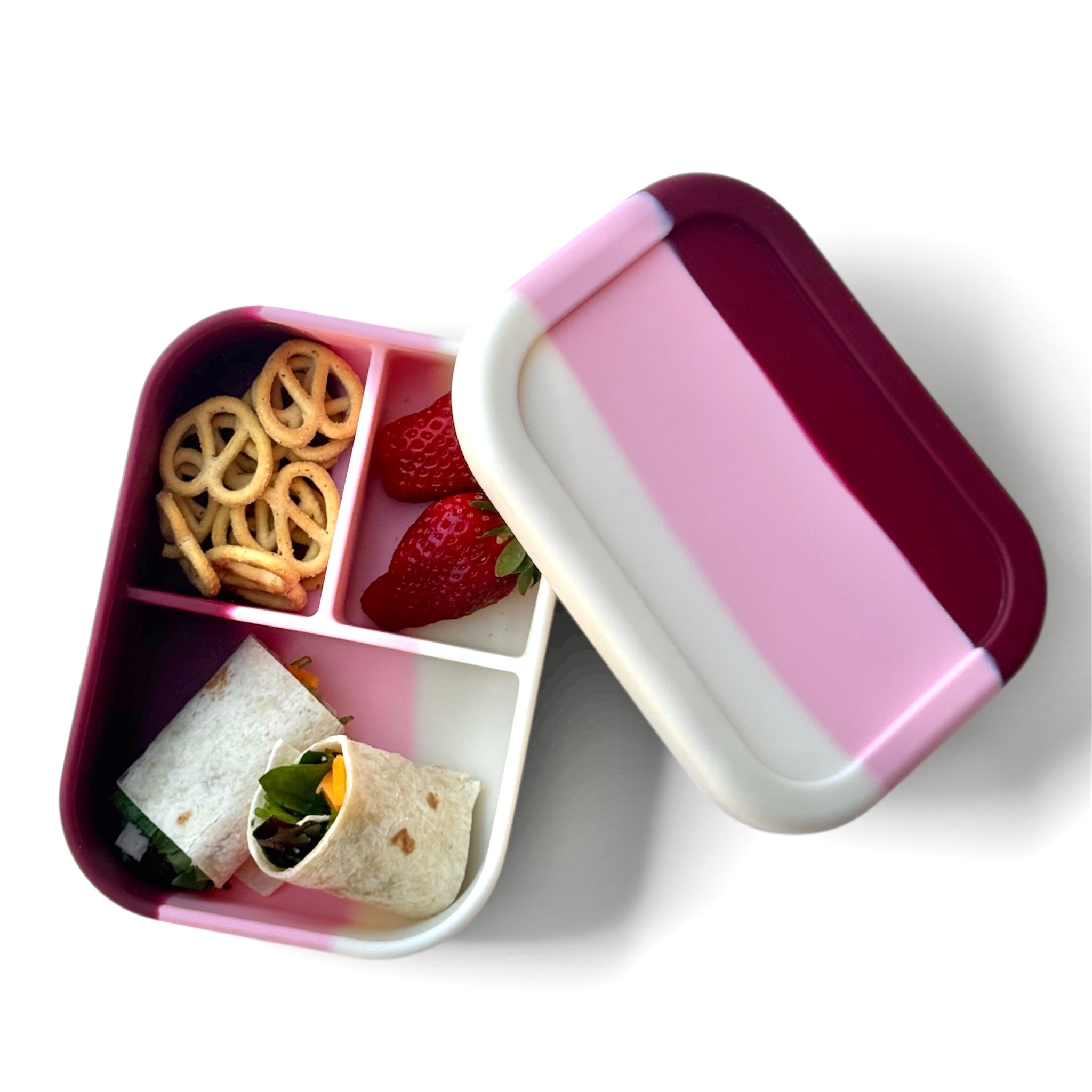 Bumble & Ivy Berry Blush 3 compartment silicone bento box packed with wraps, strawberries and snacks for kids school lunches and healthy lunch ideas