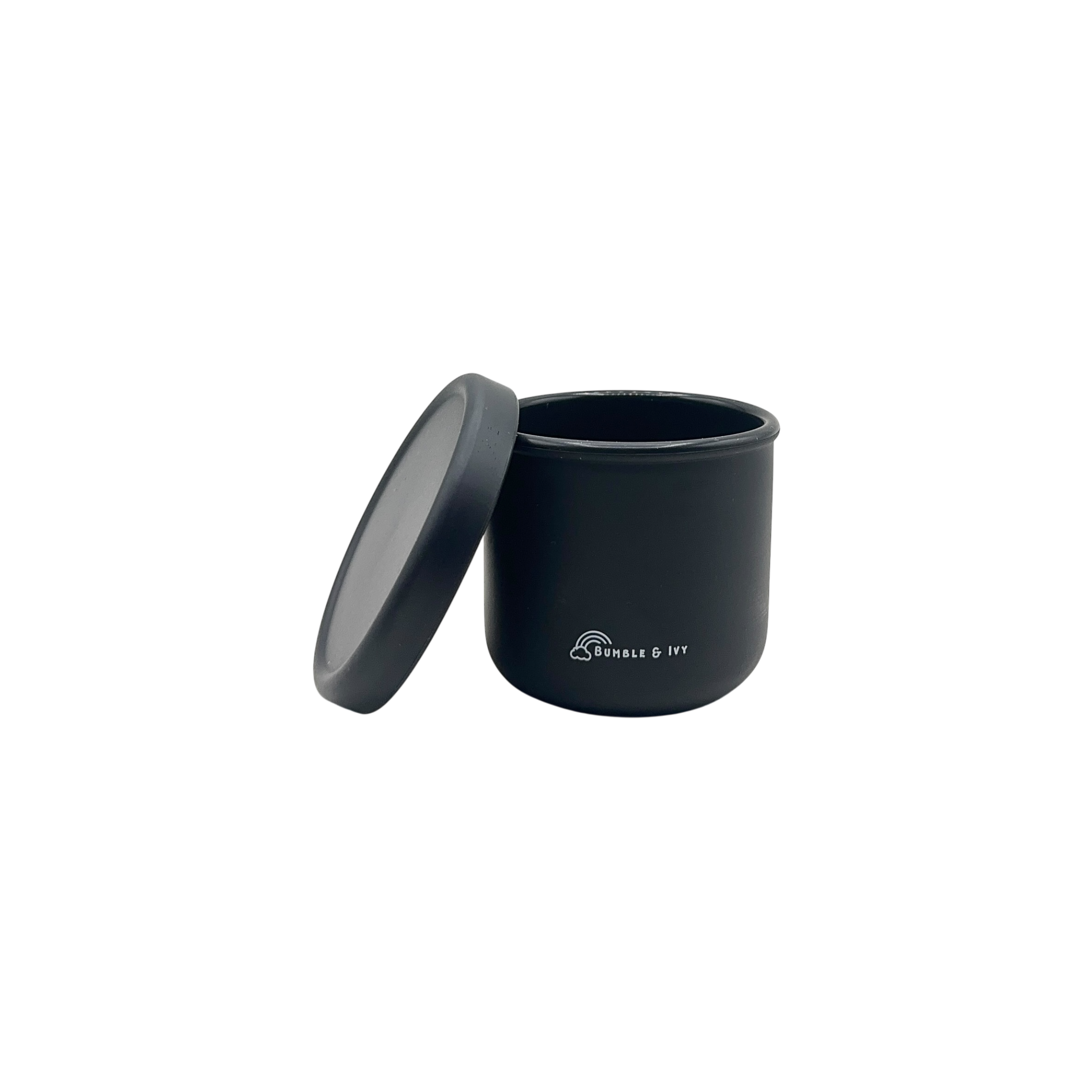 Transparent background view of an open Bumble & Ivy midnight black silicone snack pot, a durable and flexible food container ideal for baby-led weaning and toddler nursery snacks.