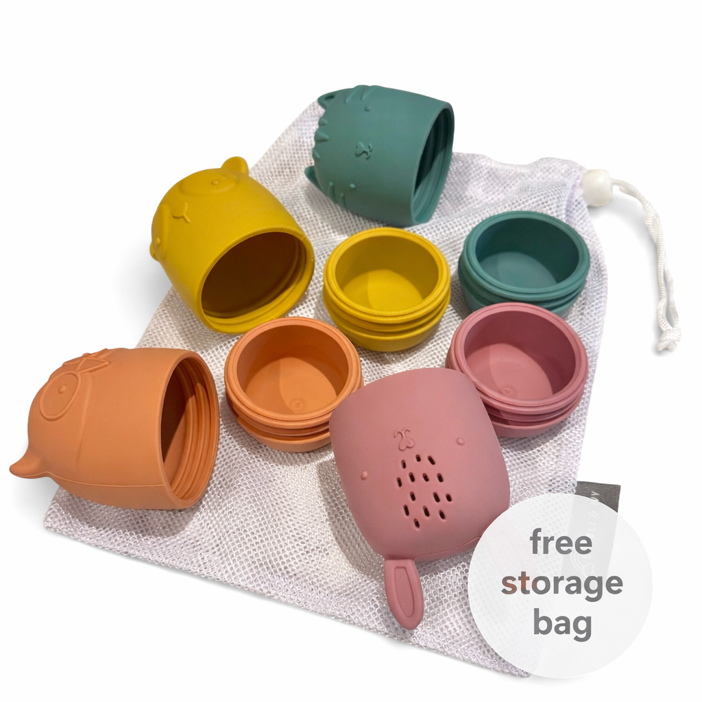 Bumble & Ivy Woodland Bath Toys opened to show easy-clean design with free mesh storage bag included. Mould-resistant silicone bath toys that twist apart for cleaning, helping reduce hidden mould and keeping bath time fun for babies and toddlers.