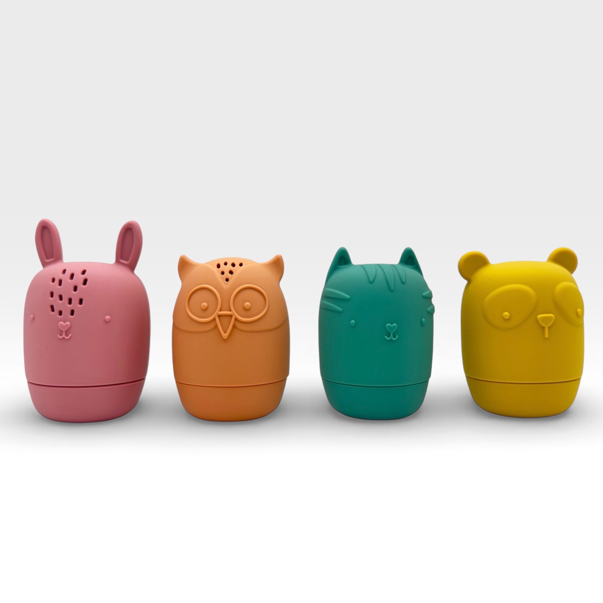 Bumble & Ivy Woodland Bath Toys set featuring bunny, owl, fox and bear characters. Easy-clean mould-resistant silicone bath toys that twist apart for cleaning, designed for sensory play and toddler bath time fun.